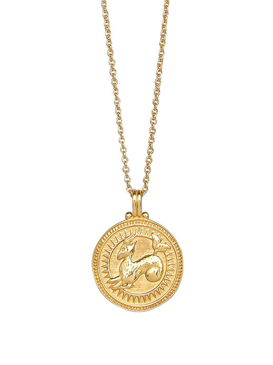 Capricorn zodiac necklace by Pola Jewellery – handcrafted in solid 18k gold with Evil Eye detail for protection. Astrology pendant, gender-neutral.