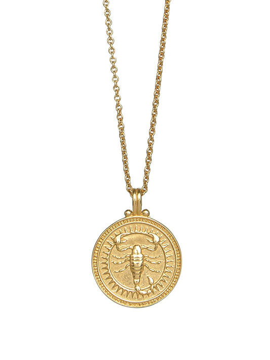 Scorpio zodiac necklace by Pola Jewellery – handcrafted in solid 18k gold with Evil Eye detail for protection. Astrology pendant, gender-neutral.