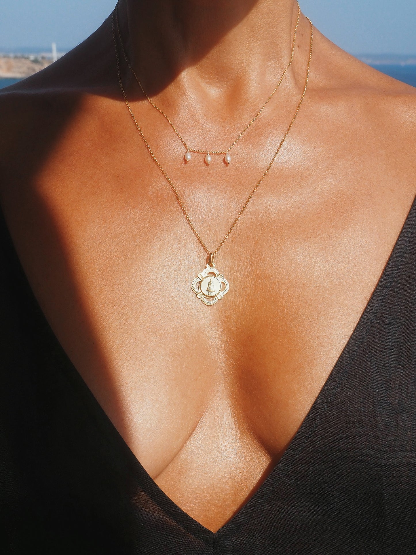 Double-chain necklace with antique Our Lady of Bonanova pendant and pearls. Gold-plated sterling silver. One-of-a-kind vintage piece.