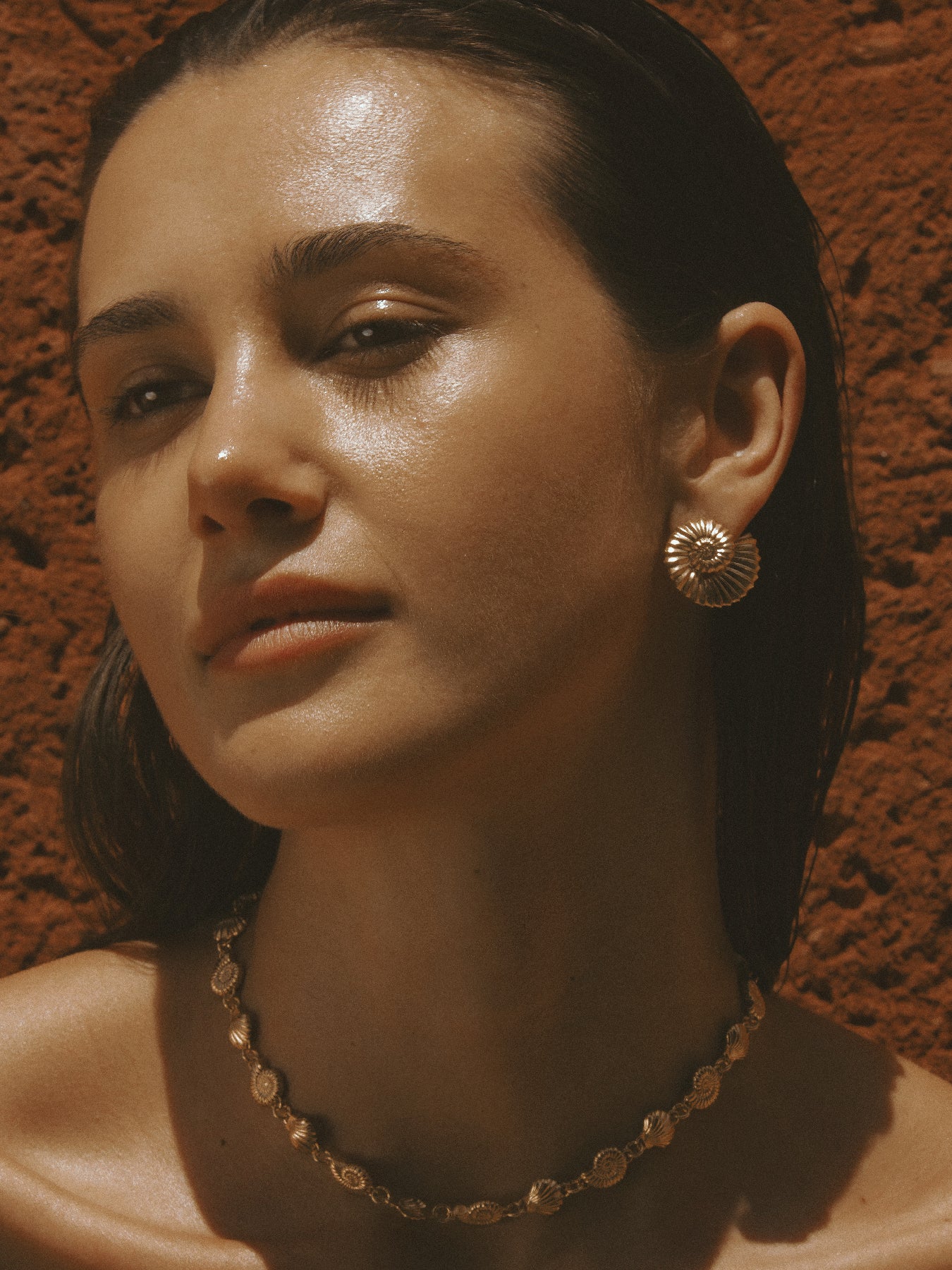 AMOR Earrings in gold vermeil by Pola Jewellery—nautilus-inspired shells symbolizing love, balance, and refined strength.