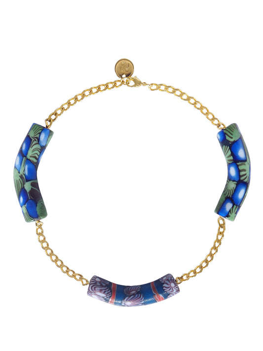 Millefiori Blue Choker by Pola Jewellery — one of a kind hand-painted millefiori glass beads in cobalt blue and green on gold-plated brass chain, statement jewellery designed in Mallorca.