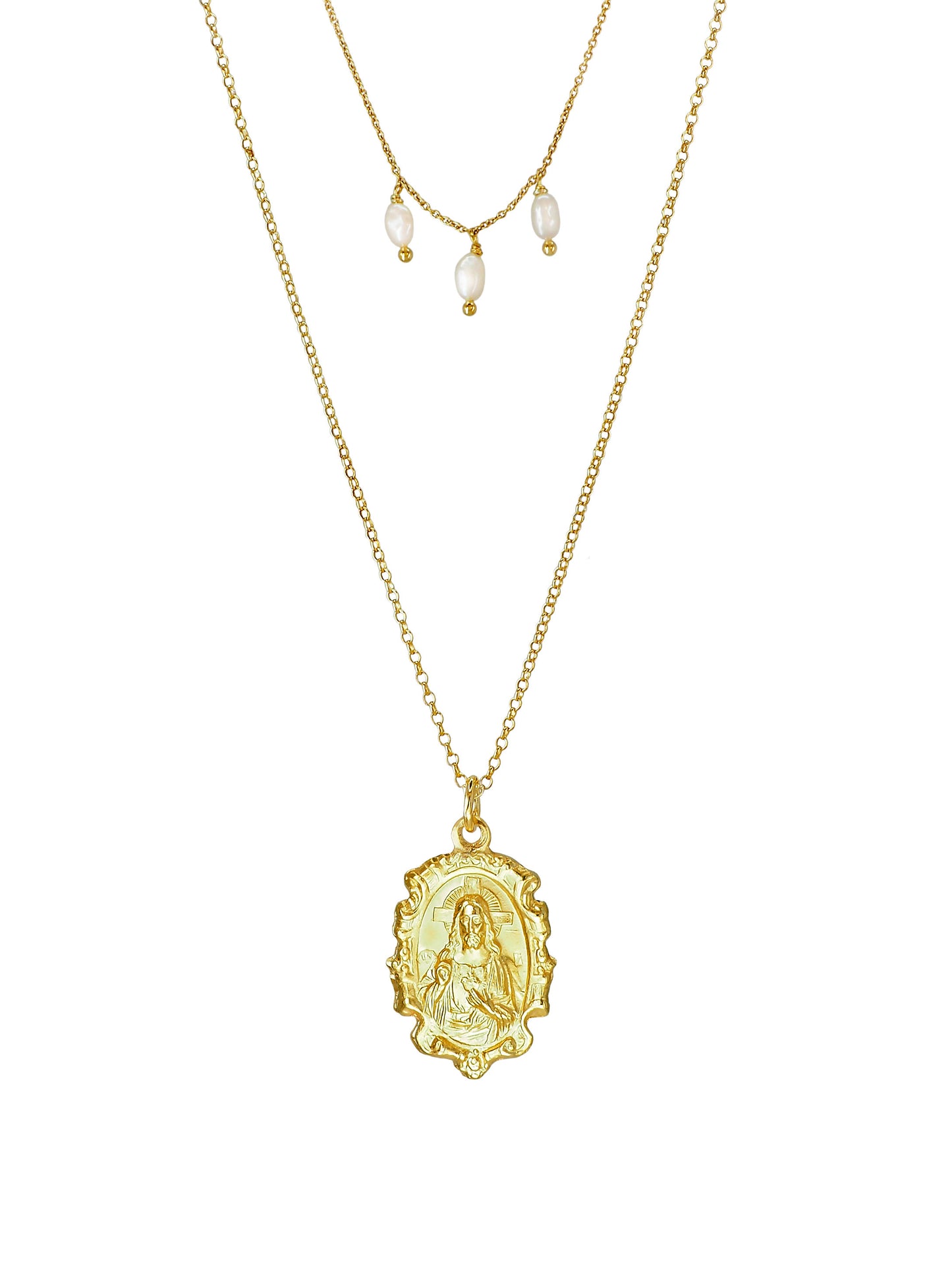 Close-up of Our Lady of Carmen pendant with Sacred Heart on gold-plated sterling-silver double-chain necklace with pearls.