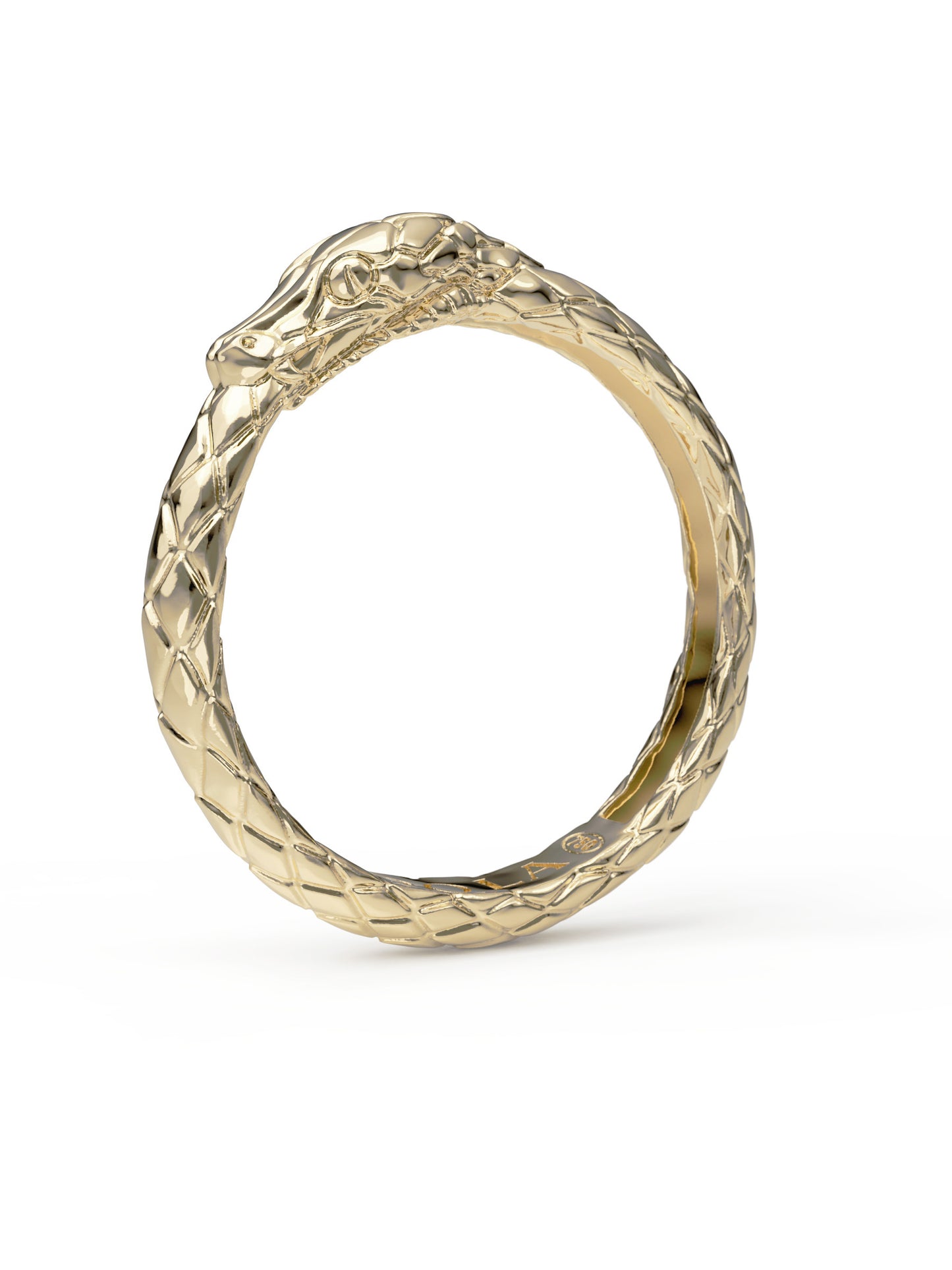 Angle view of the Ouroboros Ring in 9k solid gold by Pola Jewellery — ancient symbol of eternal cycles, custom sized and made to order in Barcelona.