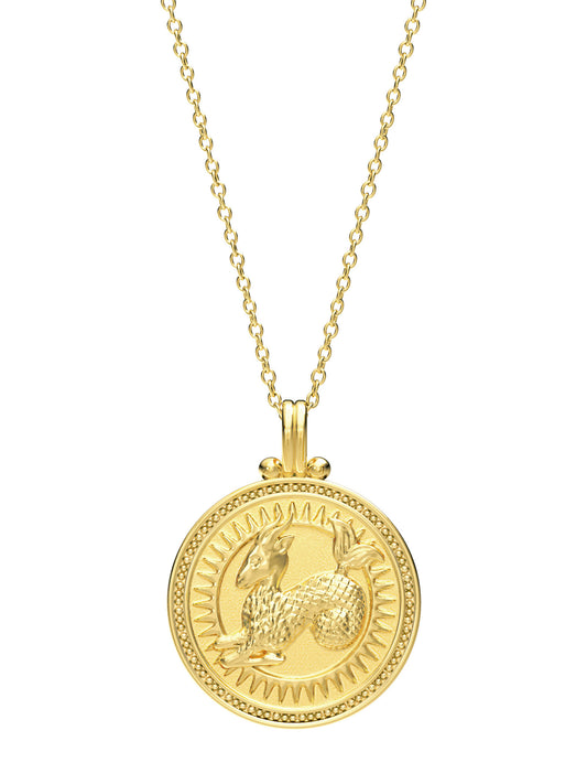 Capricorn zodiac necklace by Pola Jewellery – handcrafted in solid gold with Evil Eye detail for protection. Astrology pendant, gender-neutral.
