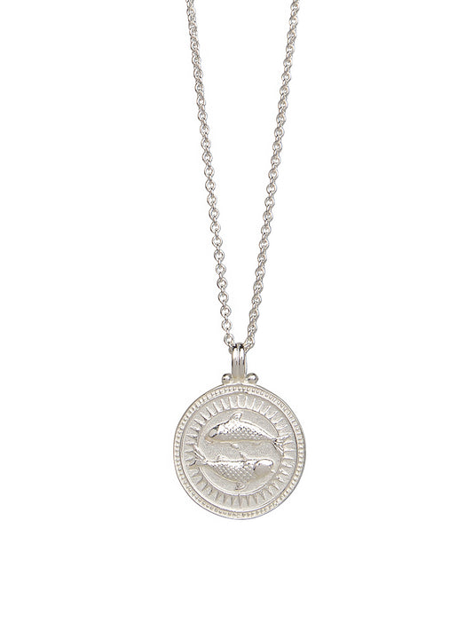 Pola Jewellery’s Pisces Zodiac Necklace in sterling silver, featuring the twin-fish motif — a talisman of empathy, creativity, and flow.