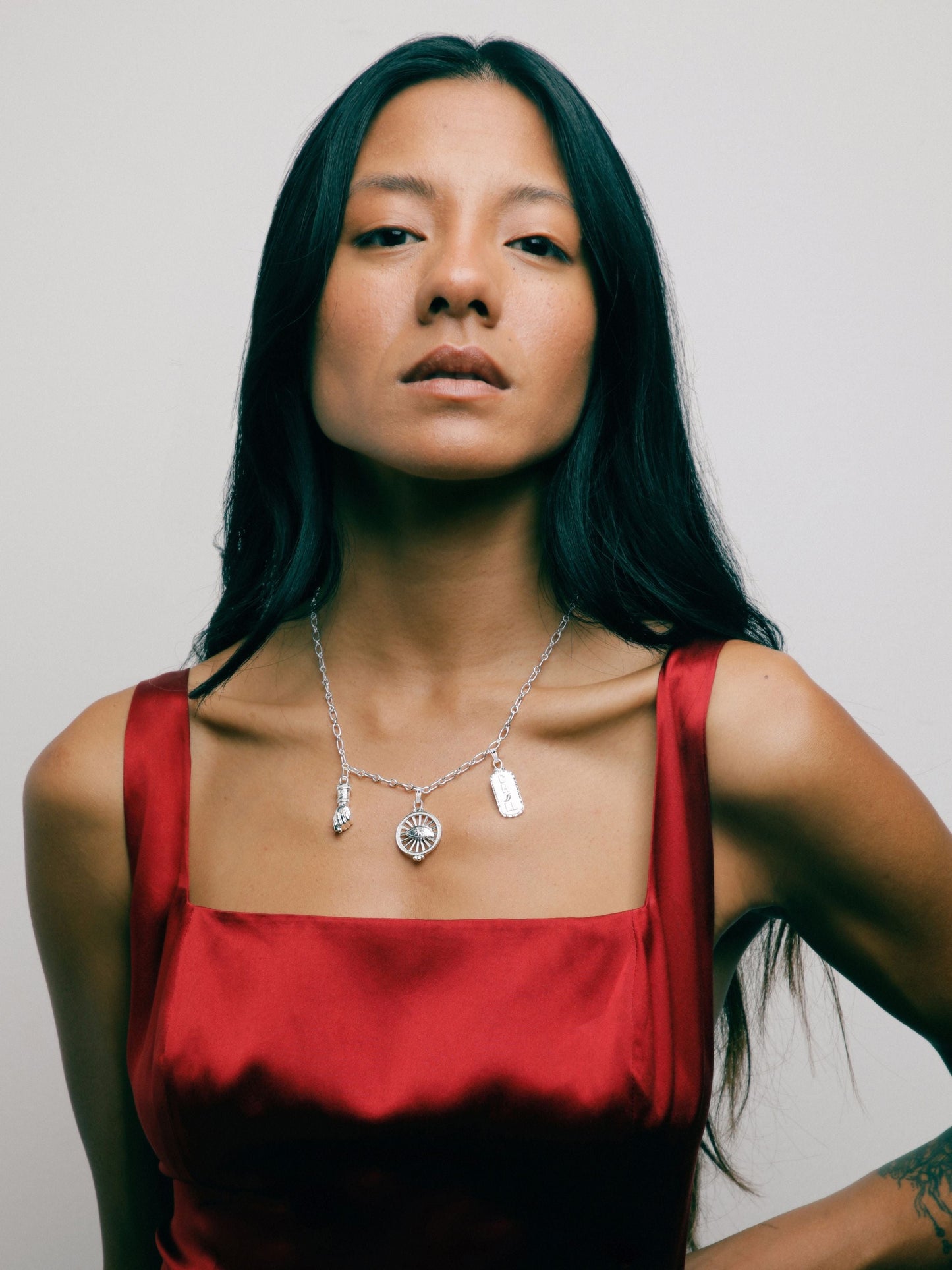 Sterling silver Talisman Necklace by Pola Jewellery with Mano Figa, Evil Eye & Chill—symbols of protection & power.