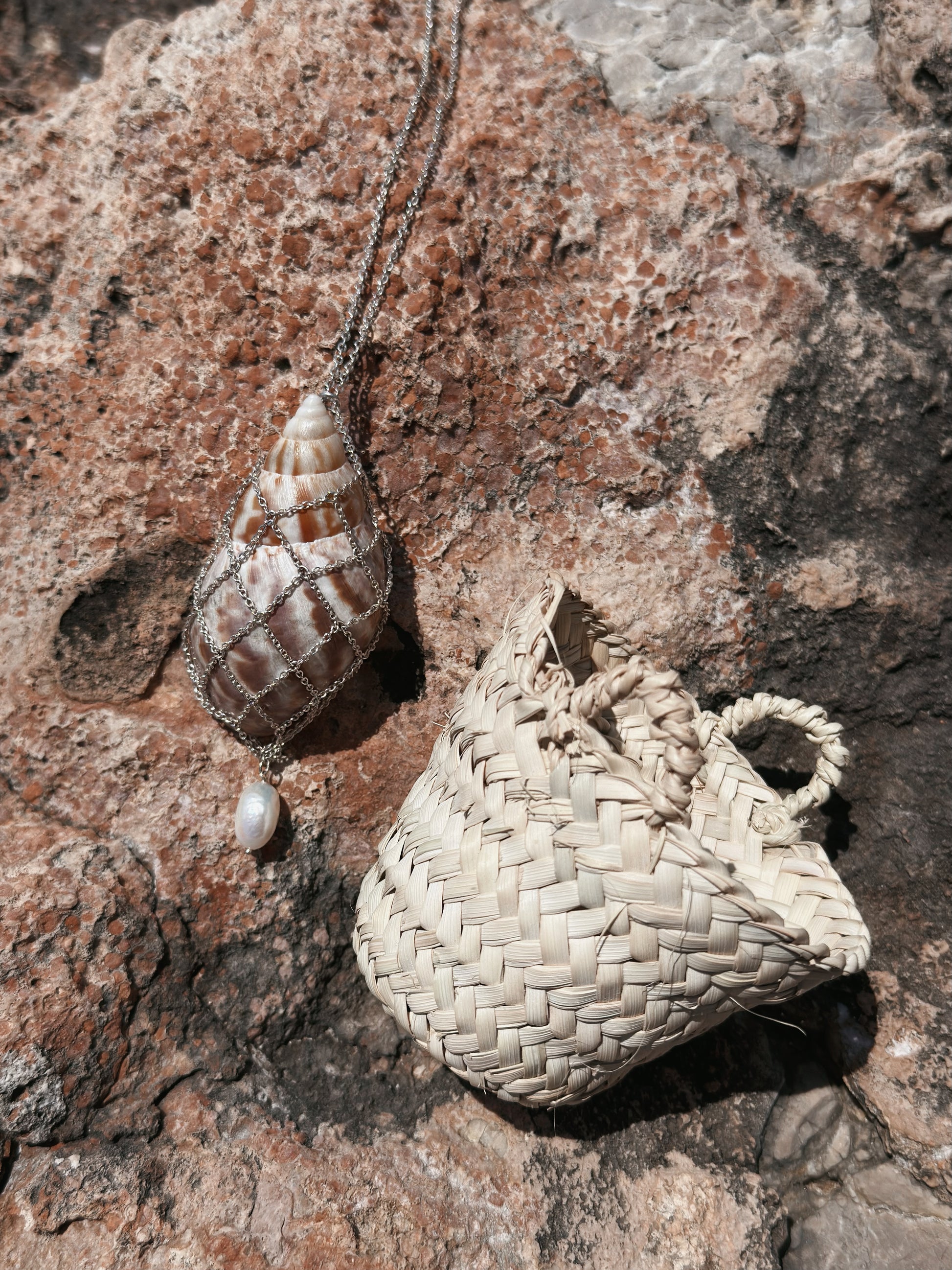 The Shell Necklace by Pola Jewellery with handmade Mallorcan island basket — limited edition shell and baroque pearl necklace, only 9 made.