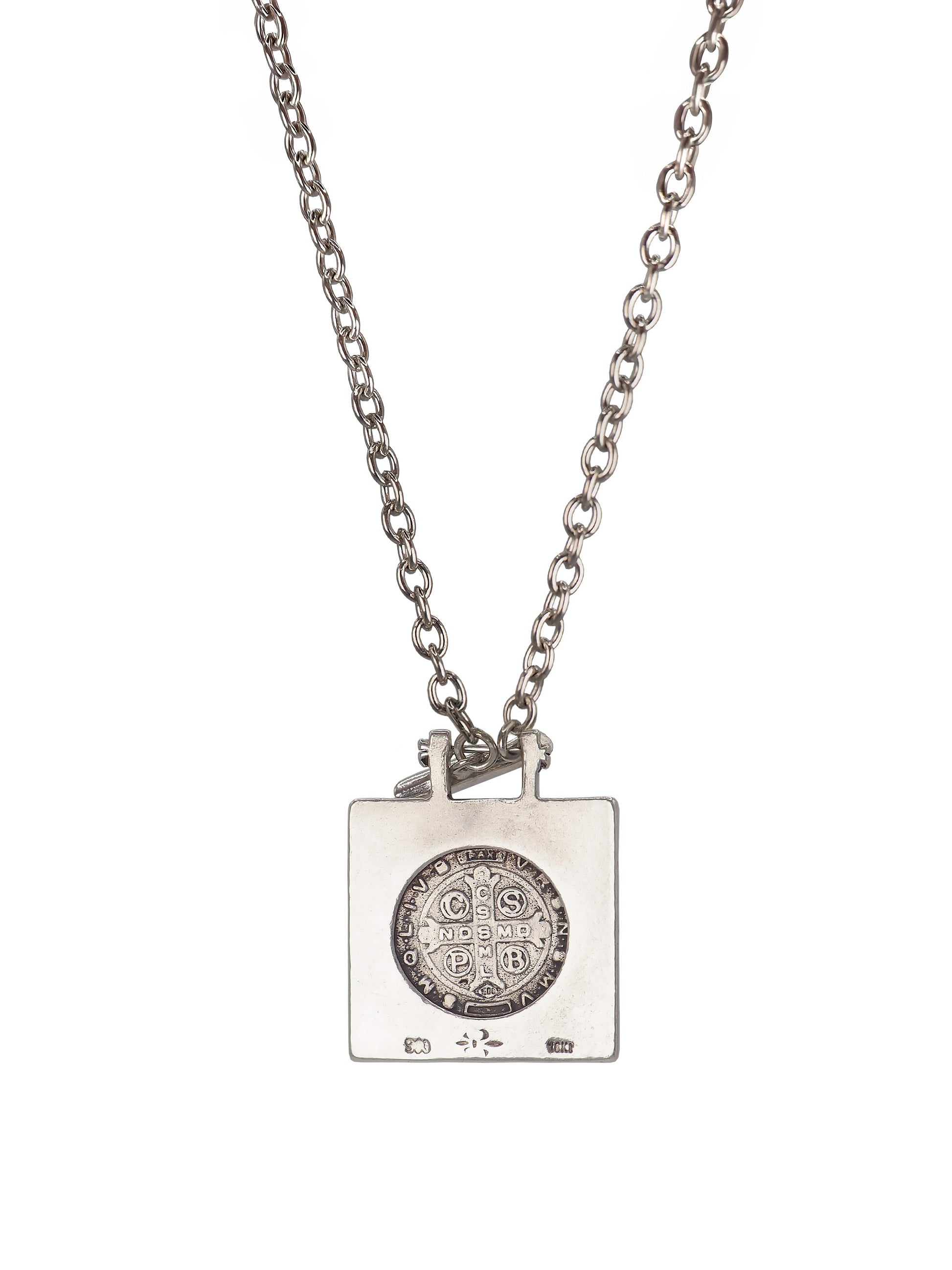 Antique St. Benedict medal sourced in Buenos Aires, square silver pendant with gold details.