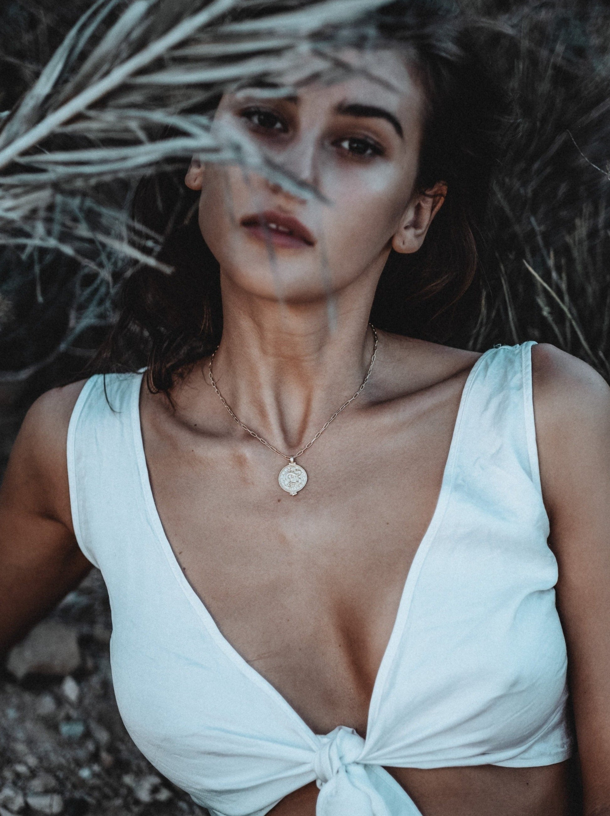 A Positive Blood Type Necklace in gold vermeil – handcrafted pendant with sacred snake and Evil Eye, symbolizing strength and renewal