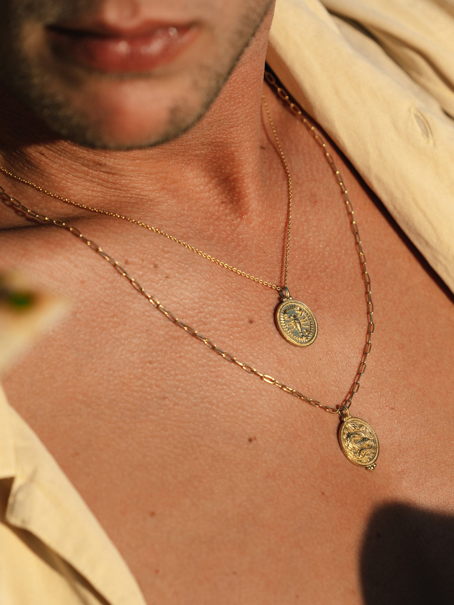 Close-up of Pola Jewellery’s Scorpio Zodiac Sign Necklace in gold vermeil, engraved with the scorpion — symbol of transformation, depth, and desire.