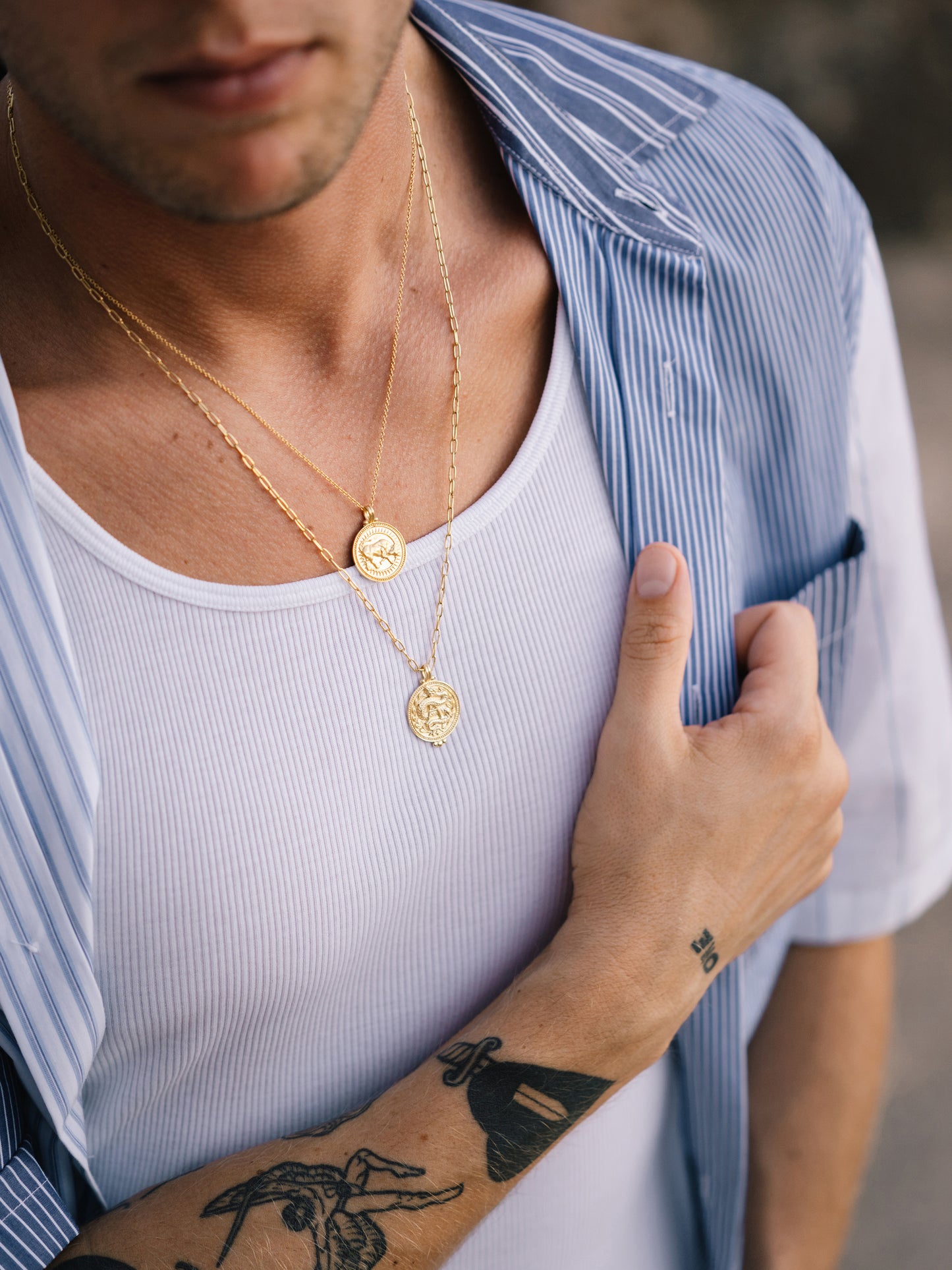 Close-up of Pola Jewellery’s Taurus Zodiac Sign Necklace in gold vermeil, engraved with the bull — symbol of strength, sensuality, and stability.